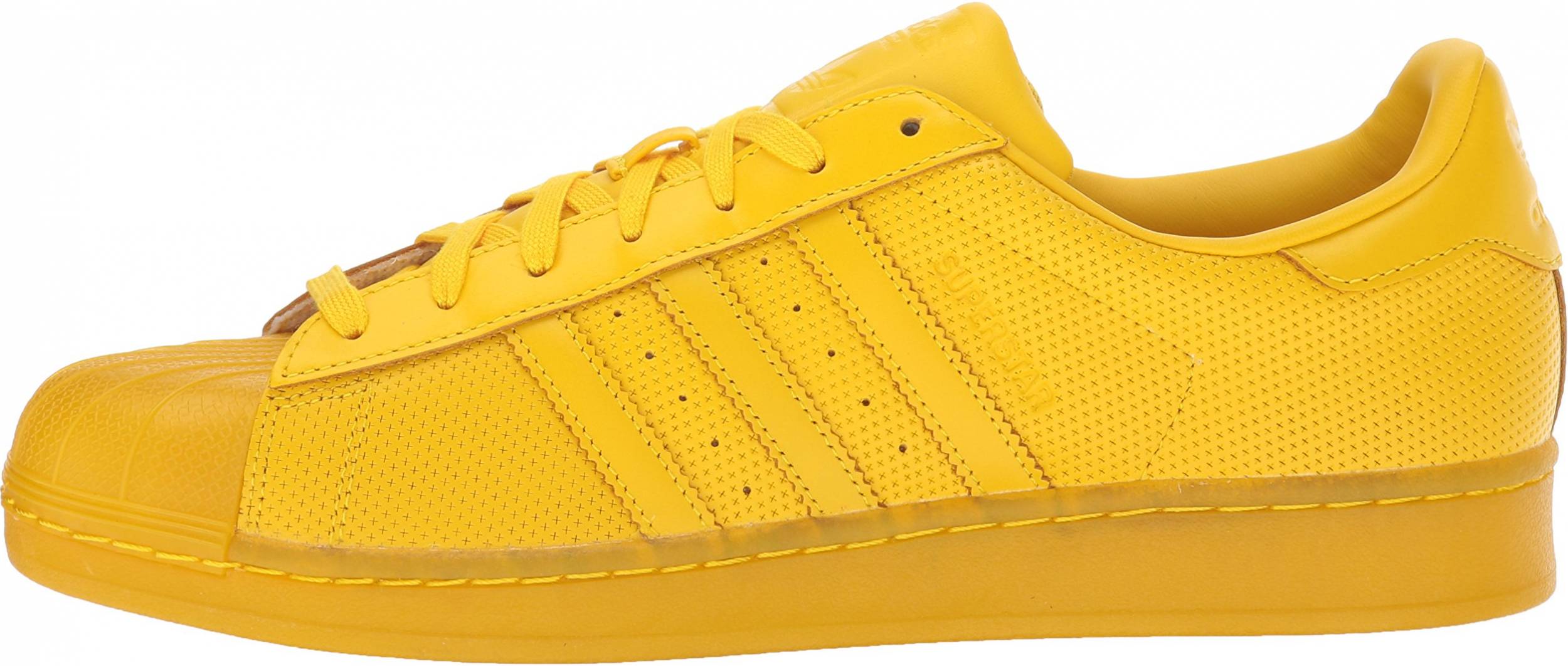 black and yellow shell toe adidas