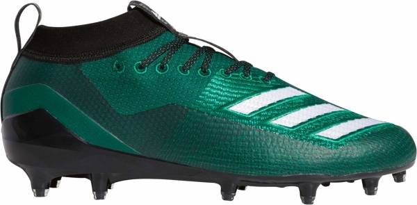 green and black football cleats