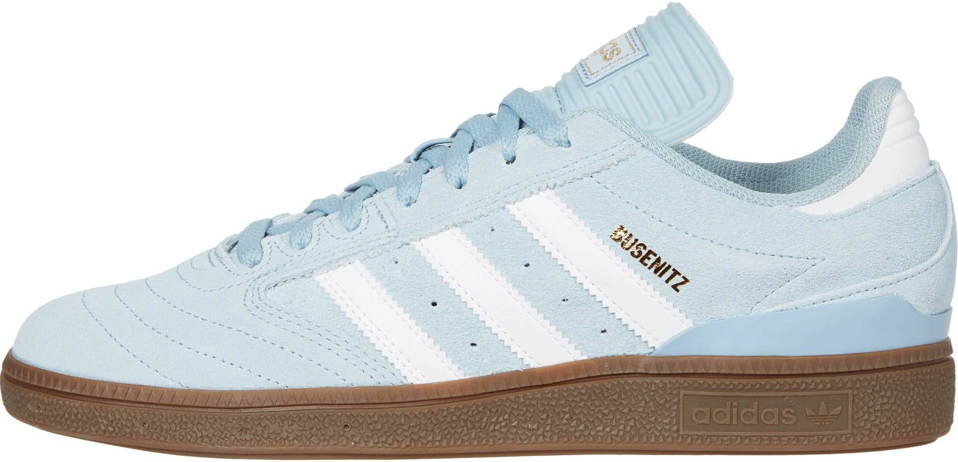 grey adidas shoes with blue stripes