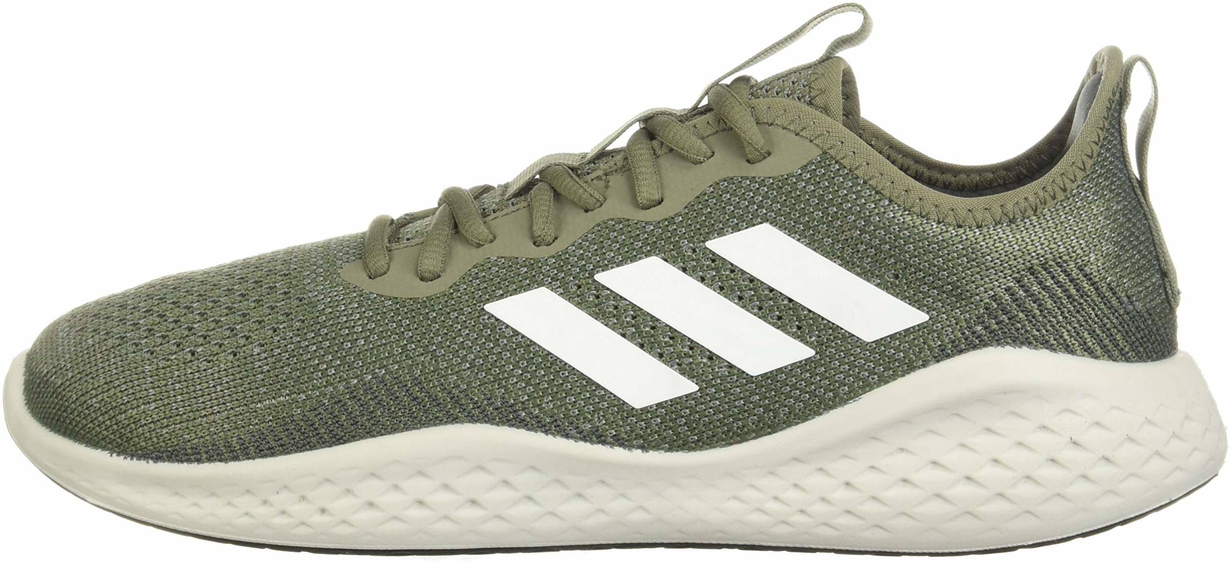 green and white adidas running shoes