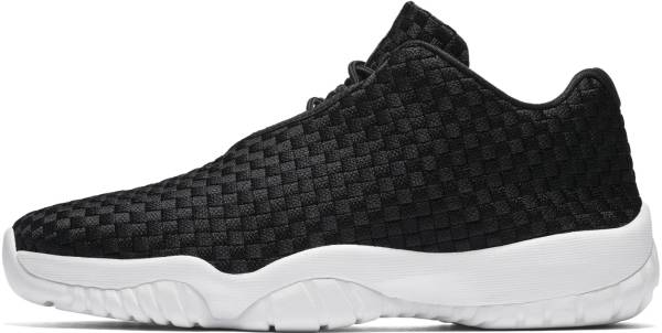 white and black low top jordans