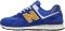 New Balance viert Grey Day Core - Royal Blue/Gold (U574HBG)