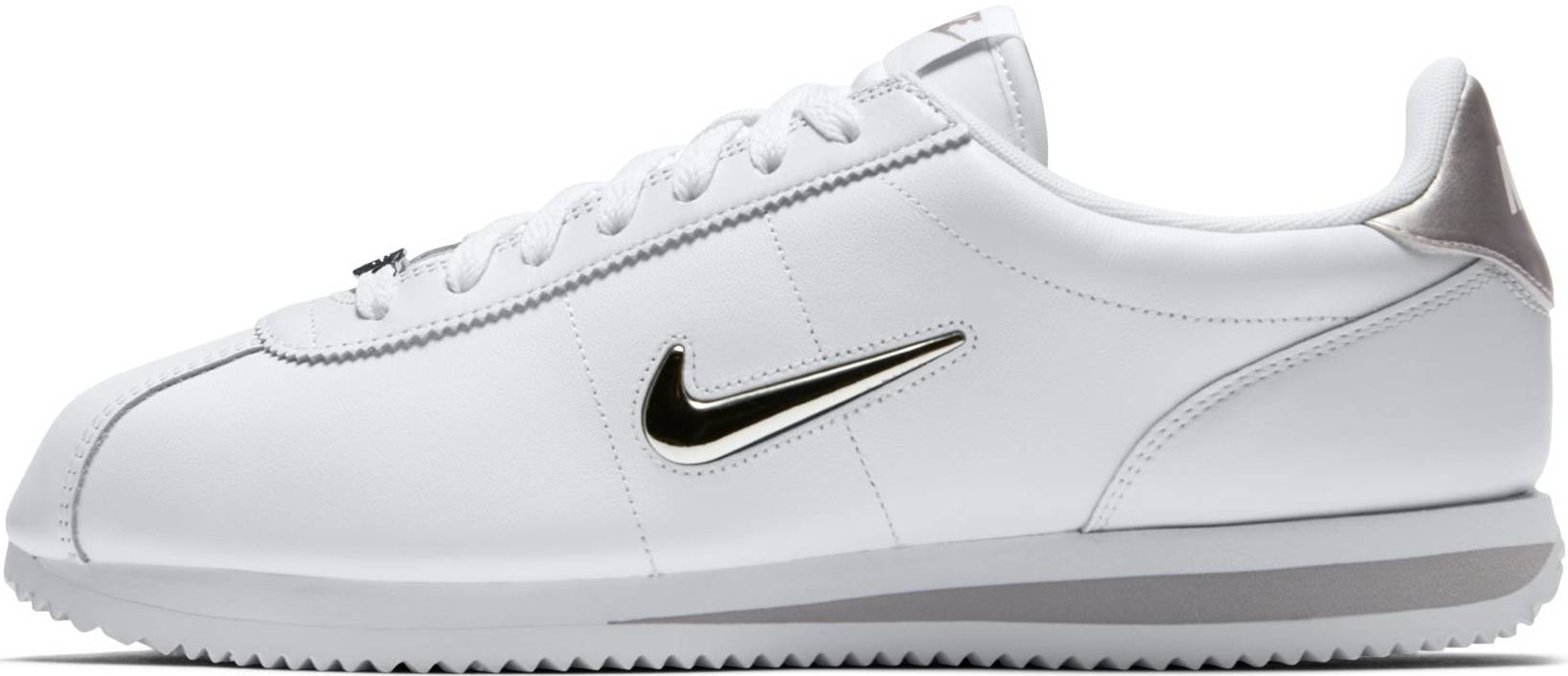white nike shoes with silver tick