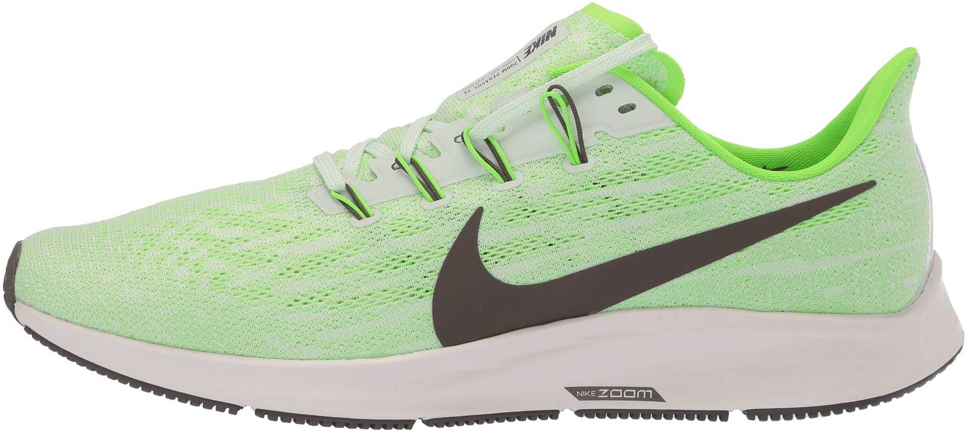 green nike track shoes