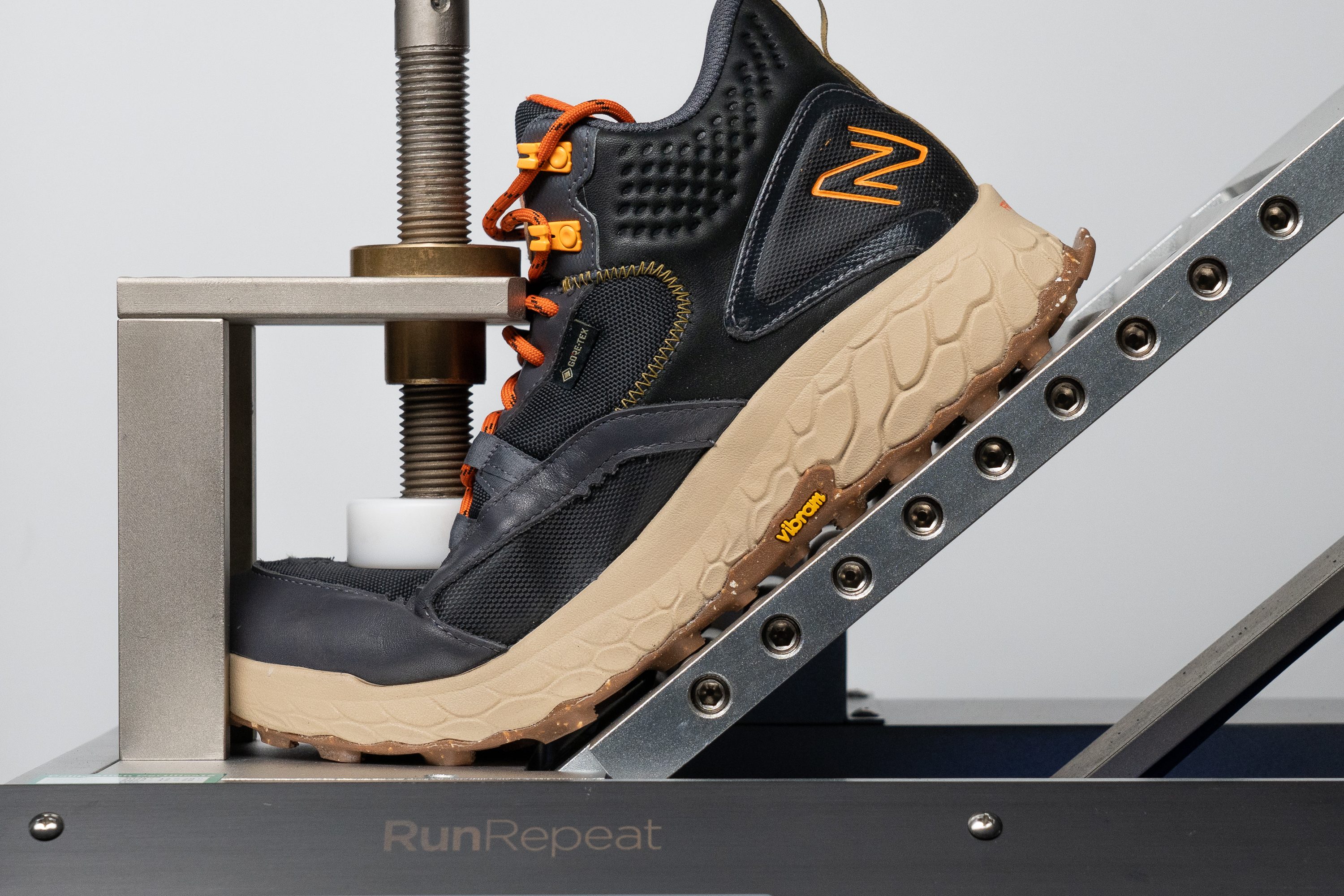 Testing the stiffness of a GTX hiking boot in RunRepeat lab