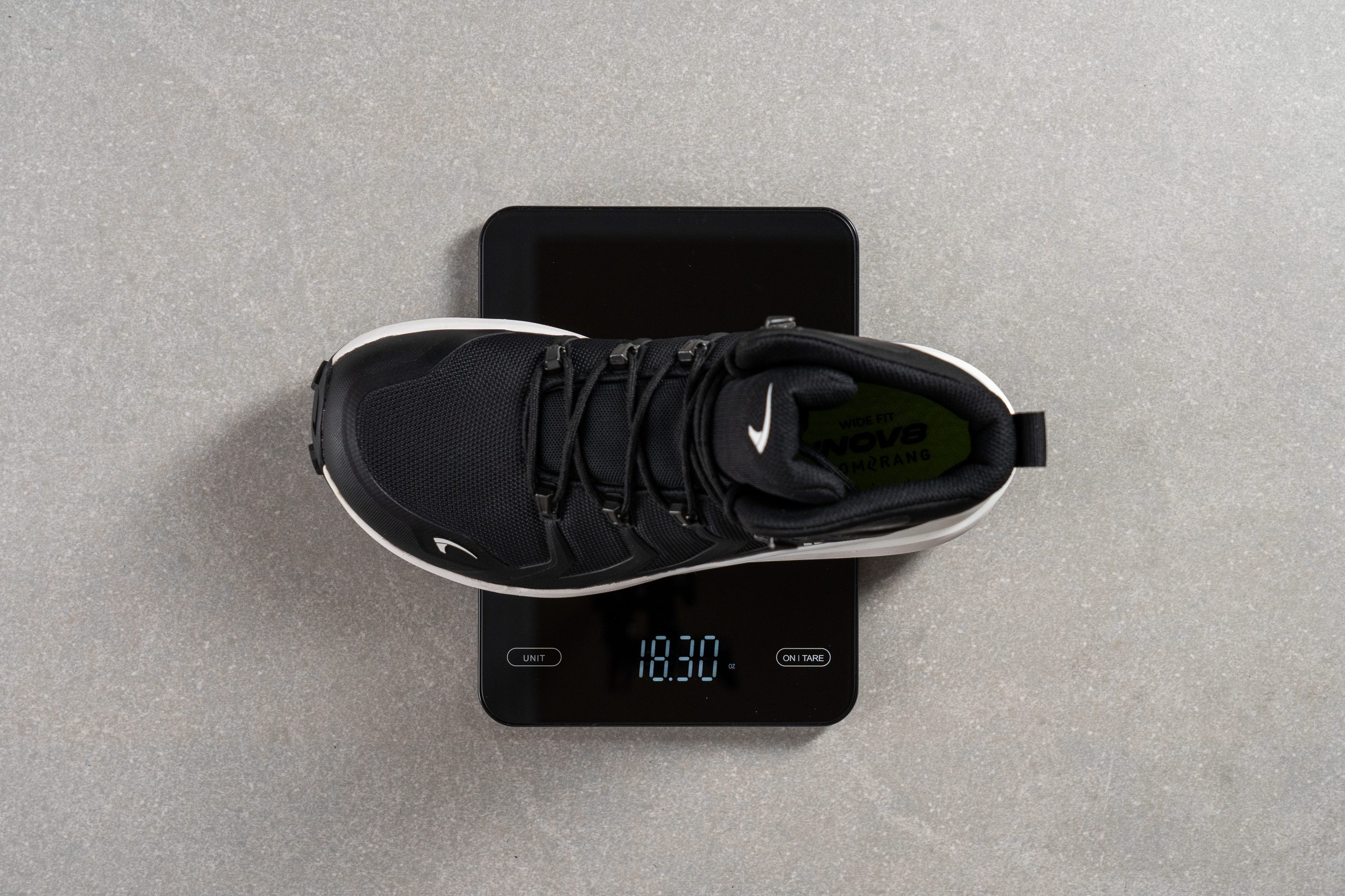 wide toebox hiking boots on a scale