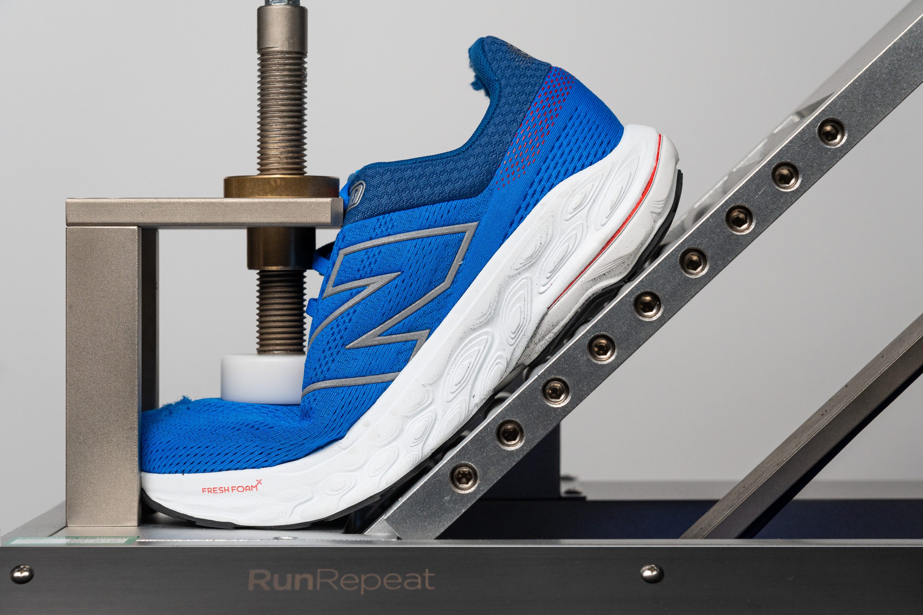 stiffness of cushioned running shoes