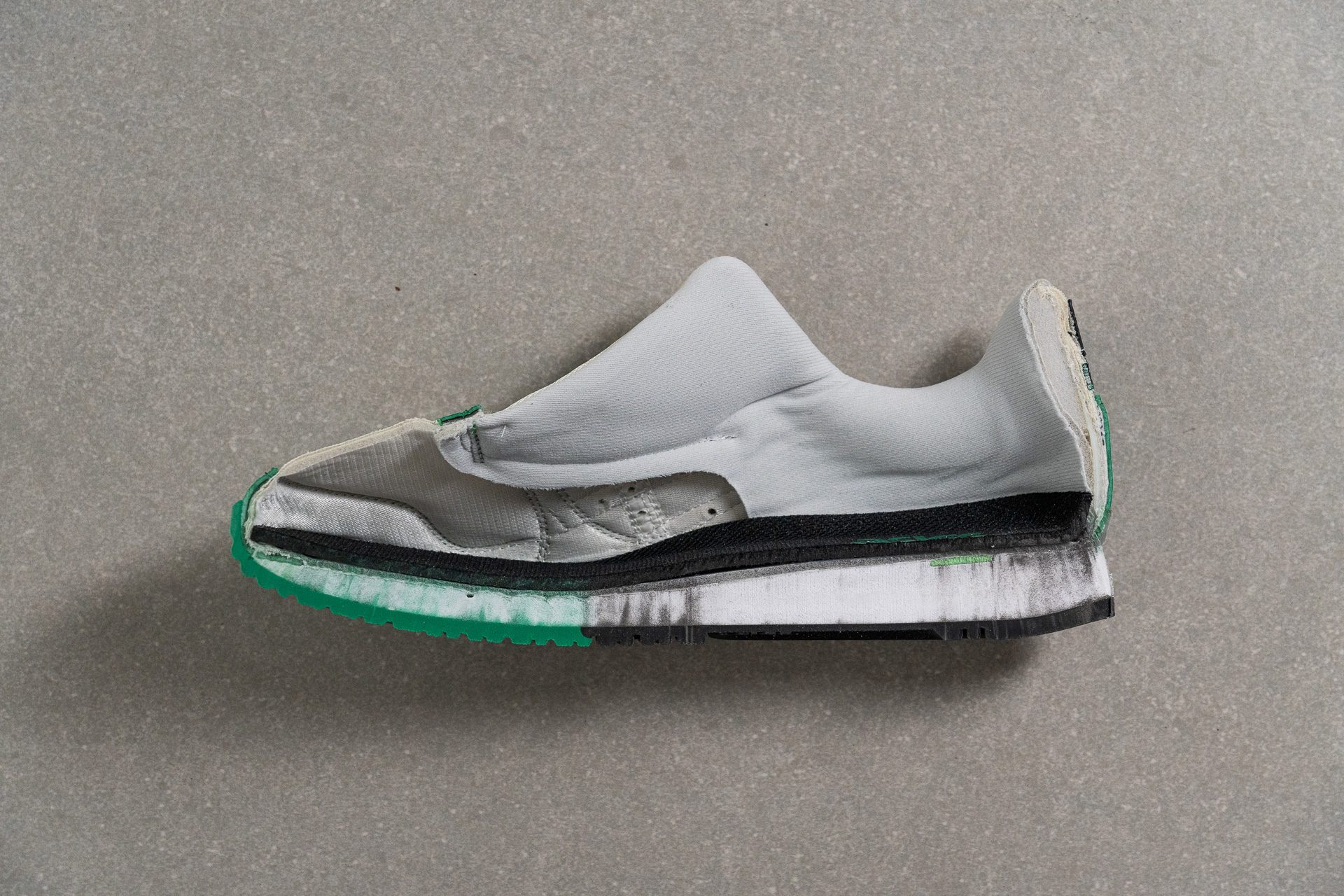 asics sneaker cut into half