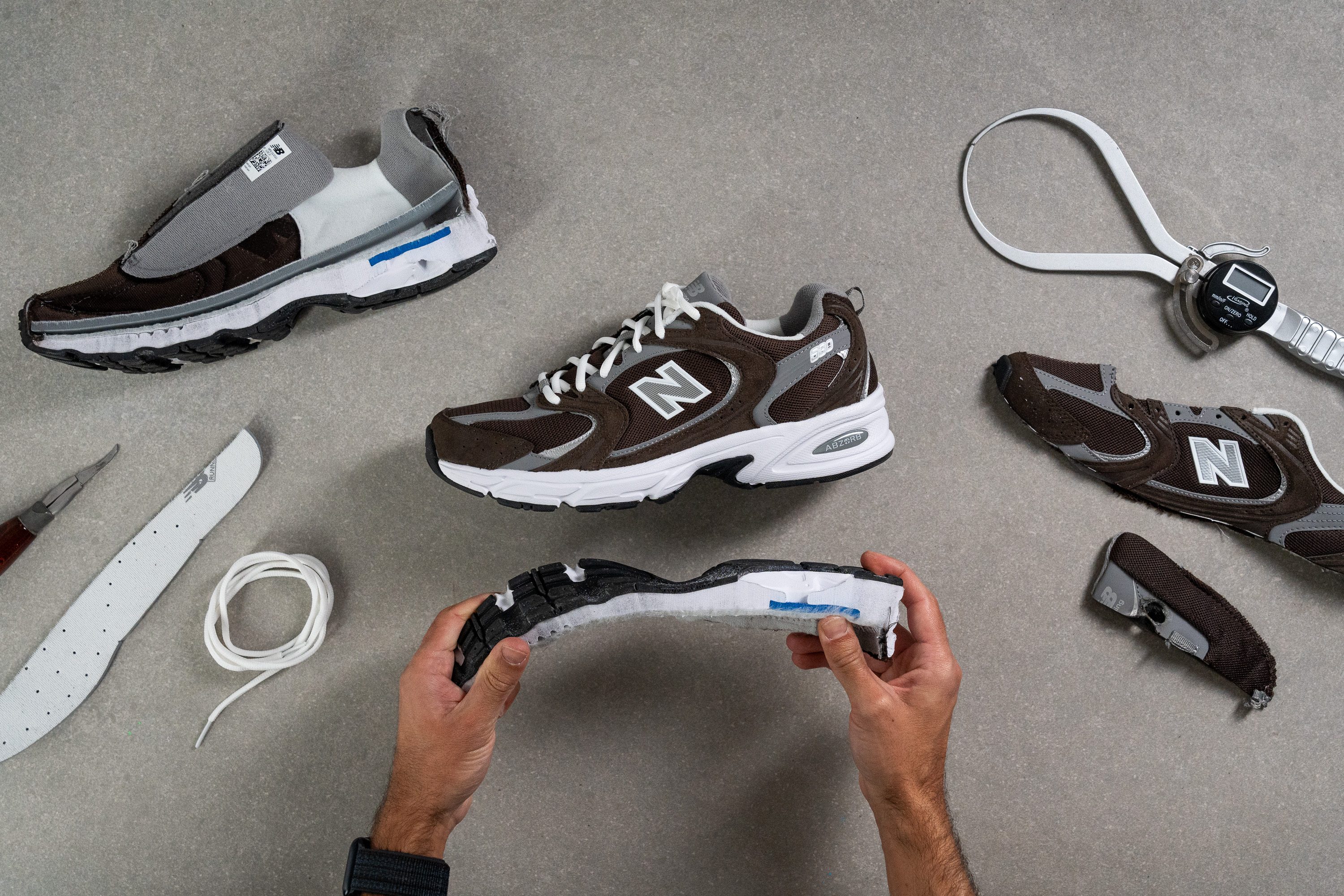 comfortable sneakers torn into pieces for lab testing