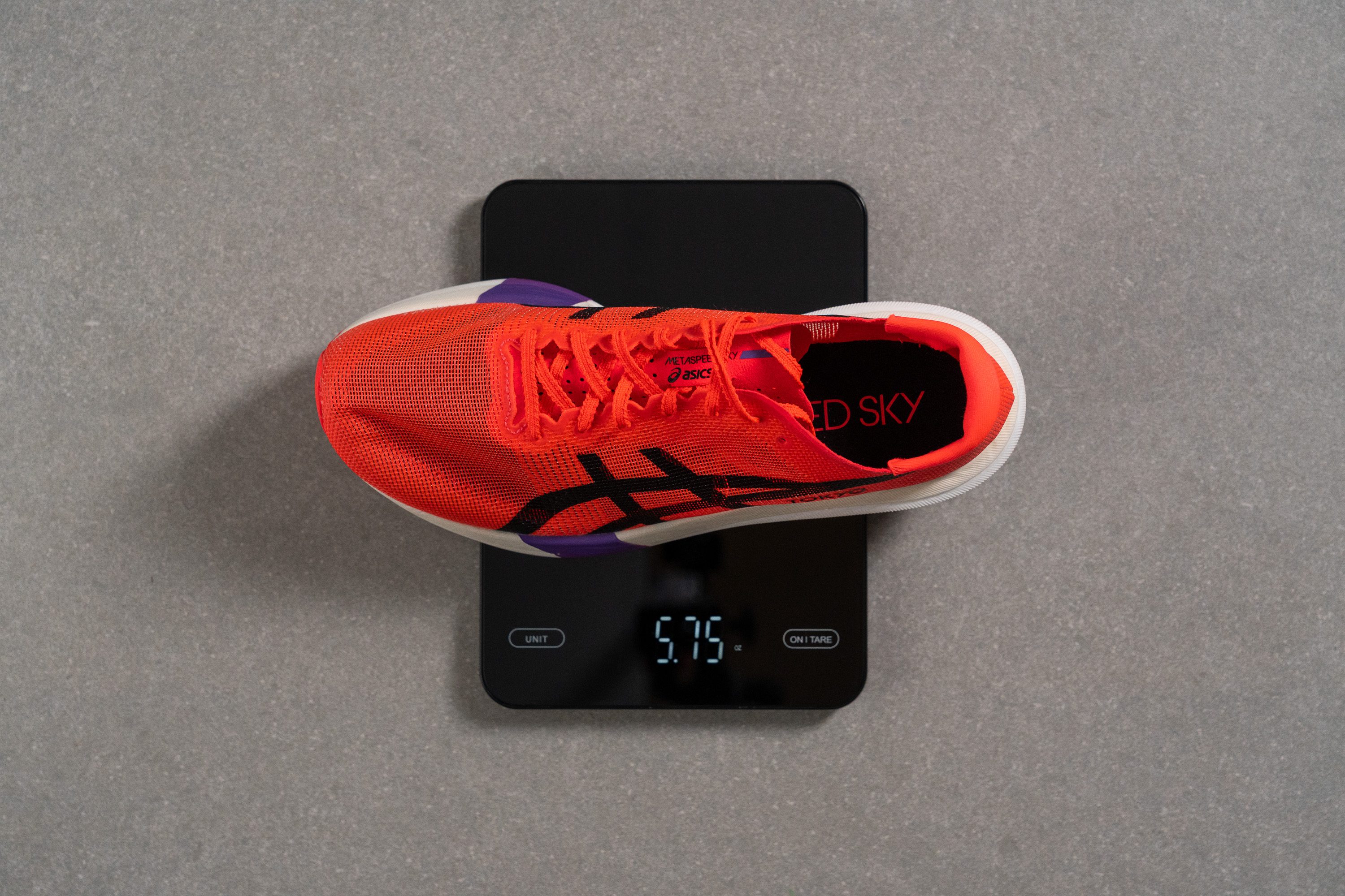 measuring the weight of super shoes