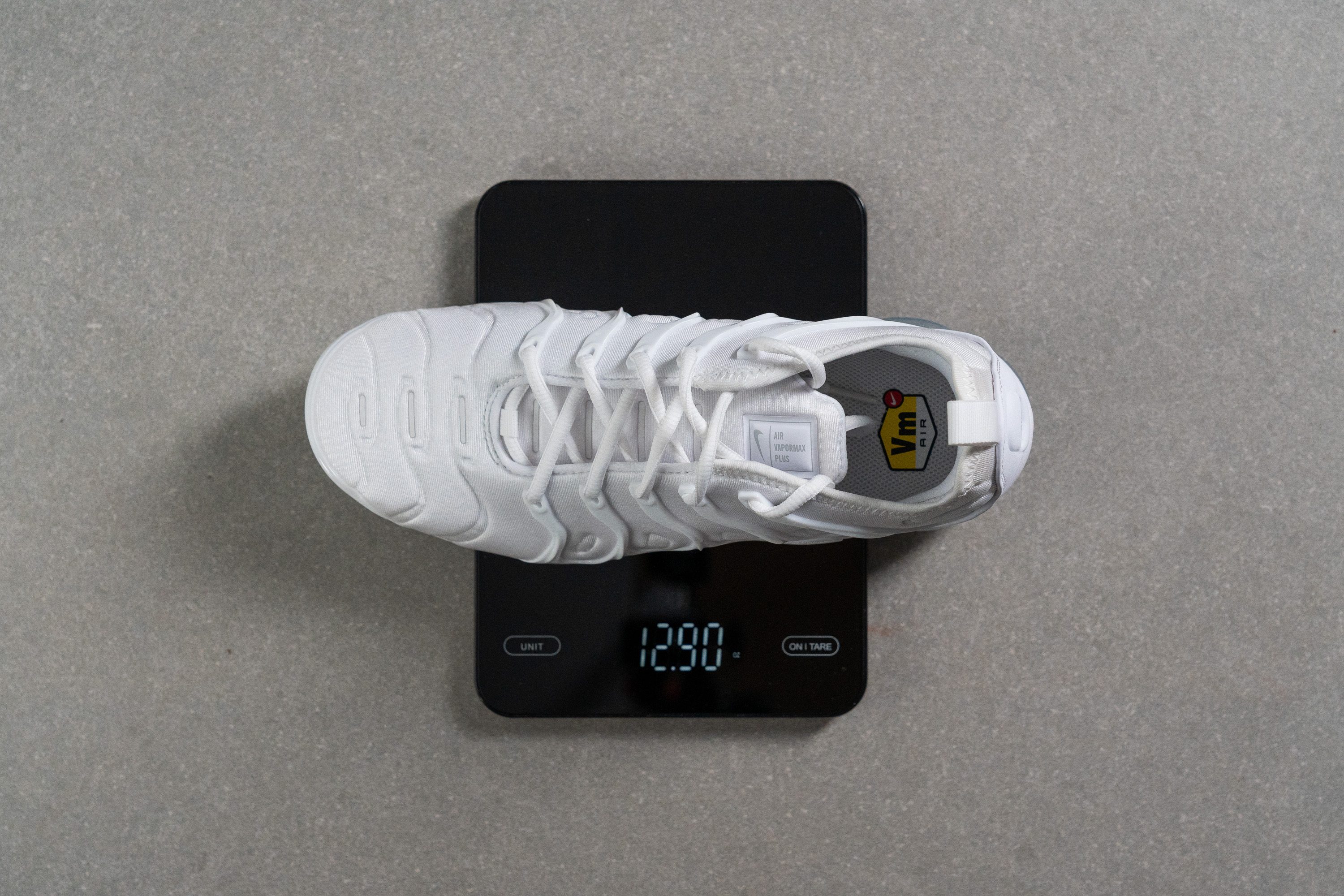 weighing high shock absorption sneakers