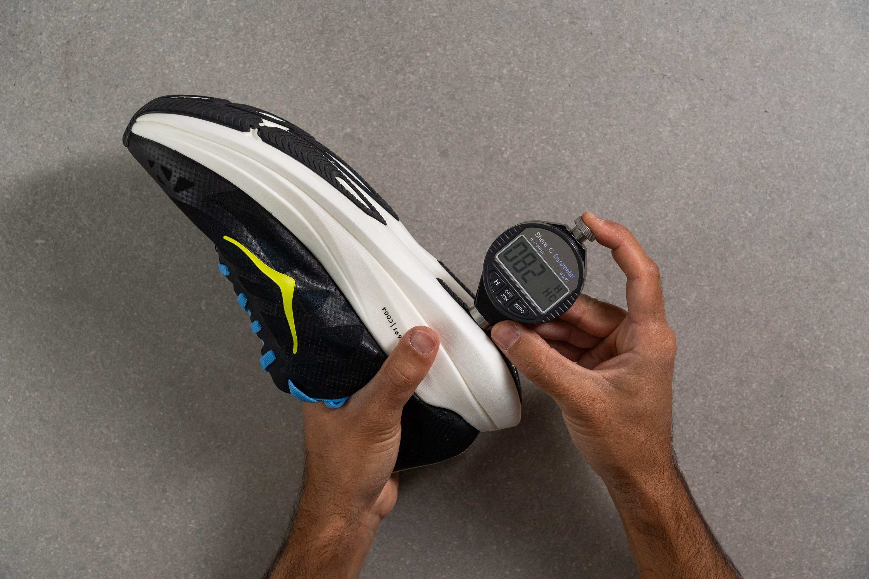 hardness of the outsole rubber in treadmill running shoes