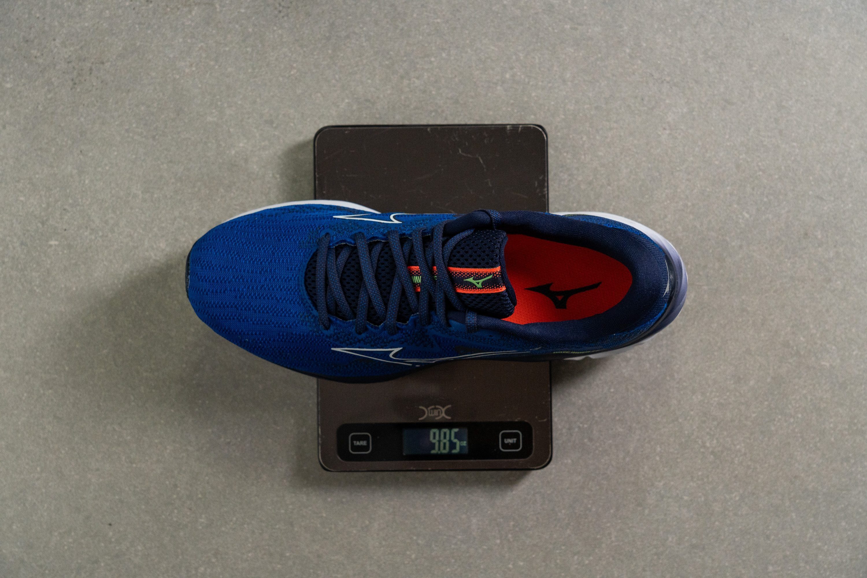 running shoe on a scale in shoe lab