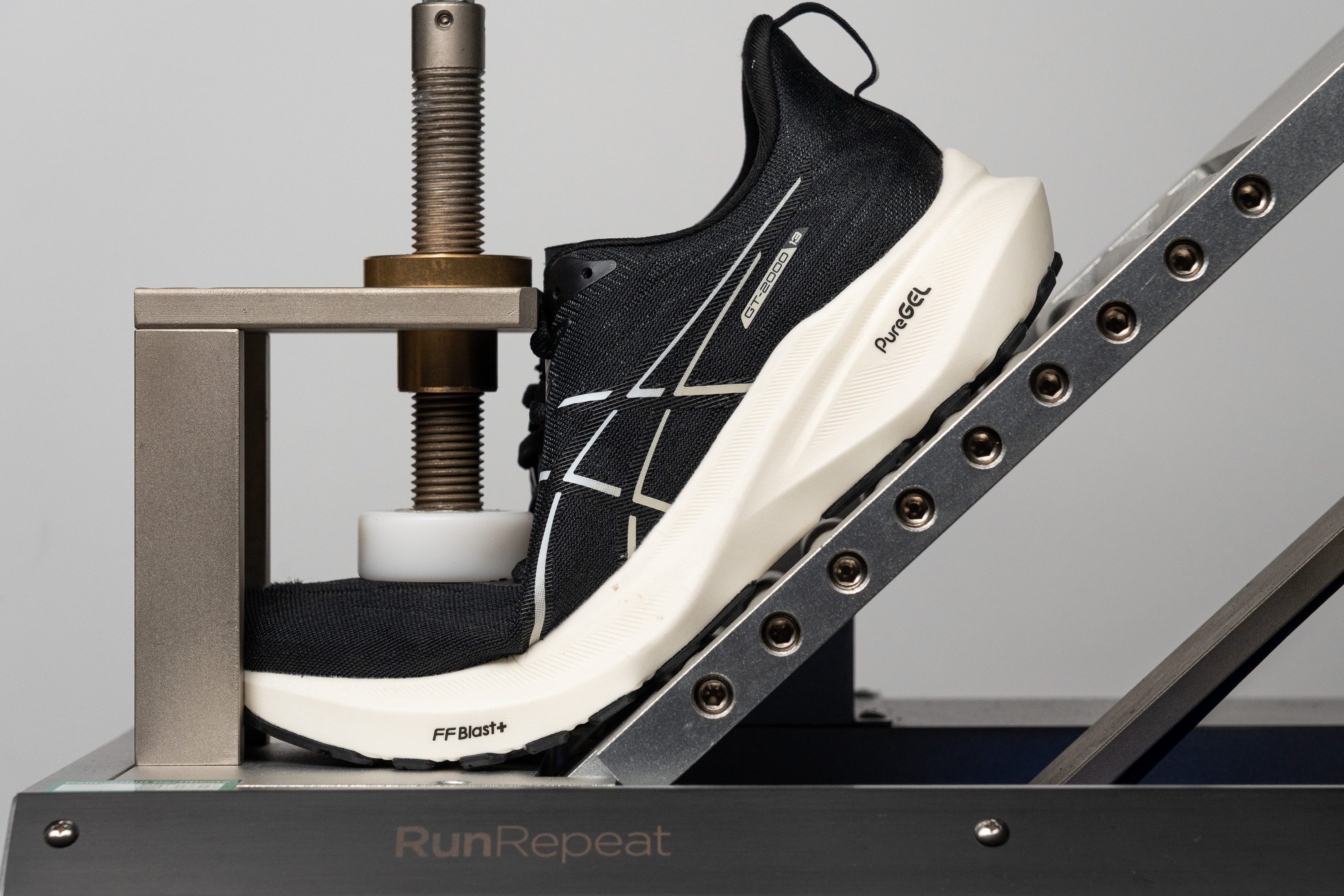 testing the stiffness of running shoes for overpronation