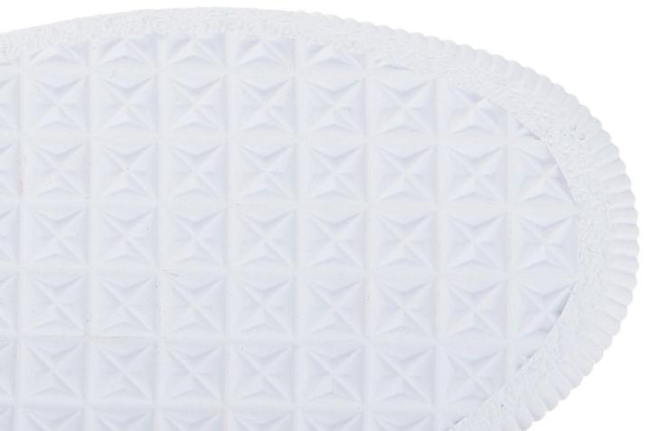 White PUMA Cat logo on the right chest outsole
