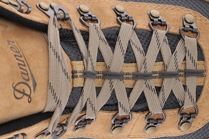 Its durable triangular lugs are formed into a geometry that provides multi-directional traction lacing system