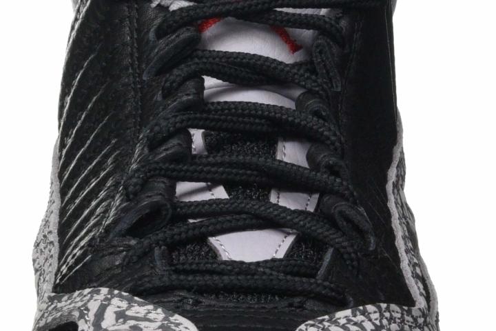 Air features jordan 11 IE Low closeup laces