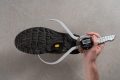 We use an average of four tests. The photo shows one of those tests Midsole width in the forefoot