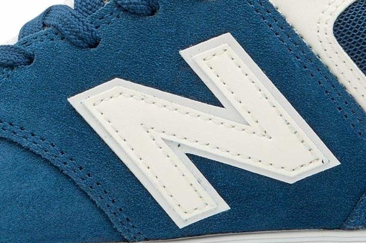 The latest New Balance 574 to hit retailers is dressed in a 574 Logo
