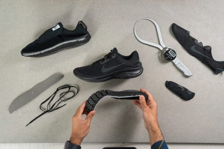 nike-flex-experience-run-11-shoe-pieces-with-hands.JPG