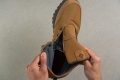 A finger loop at the back assists in getting the boot on. Nice and handy The Fairbanks Mid is a mens hiking boot from