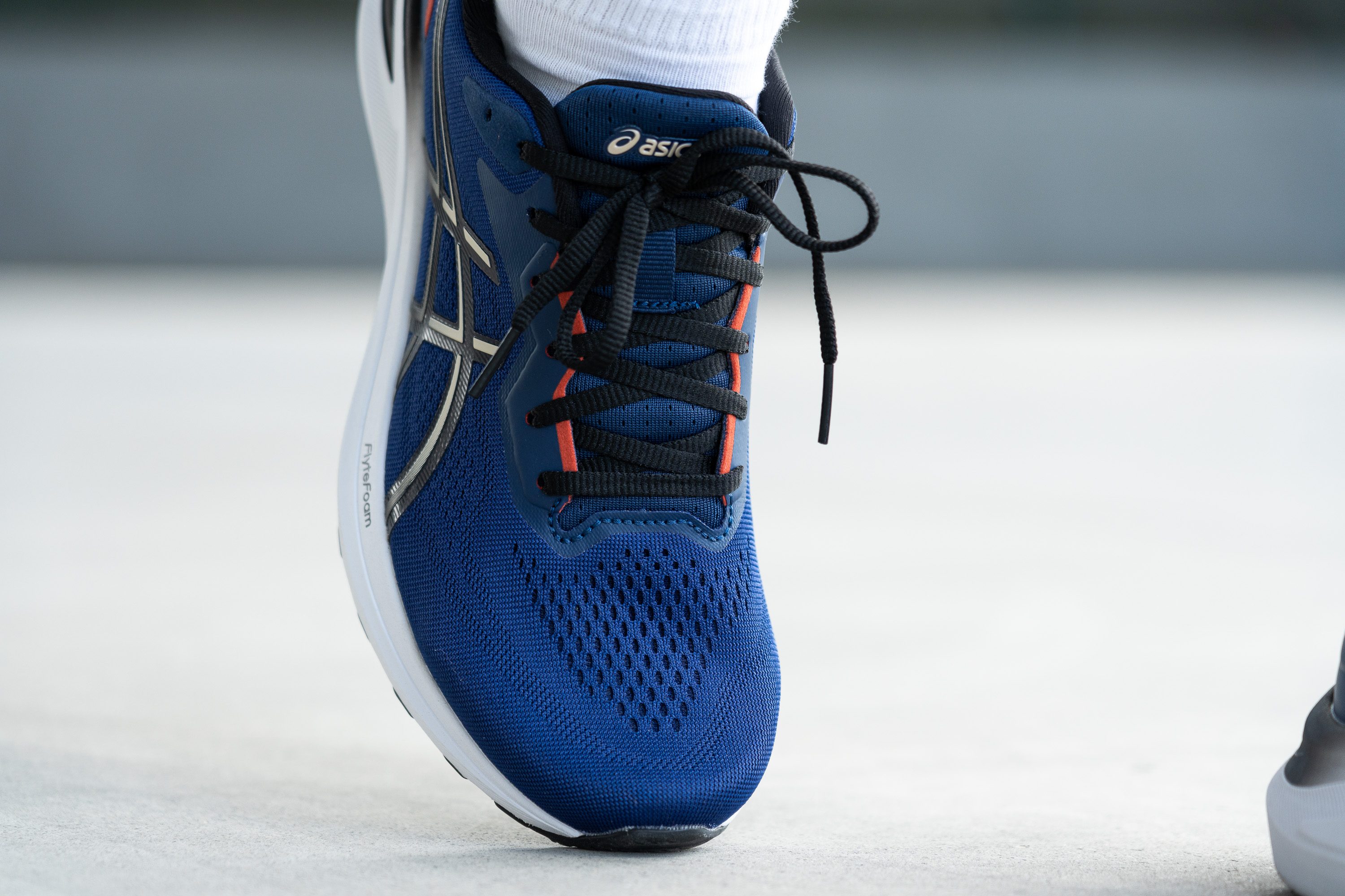 ASICS GT 1000 13 tongue