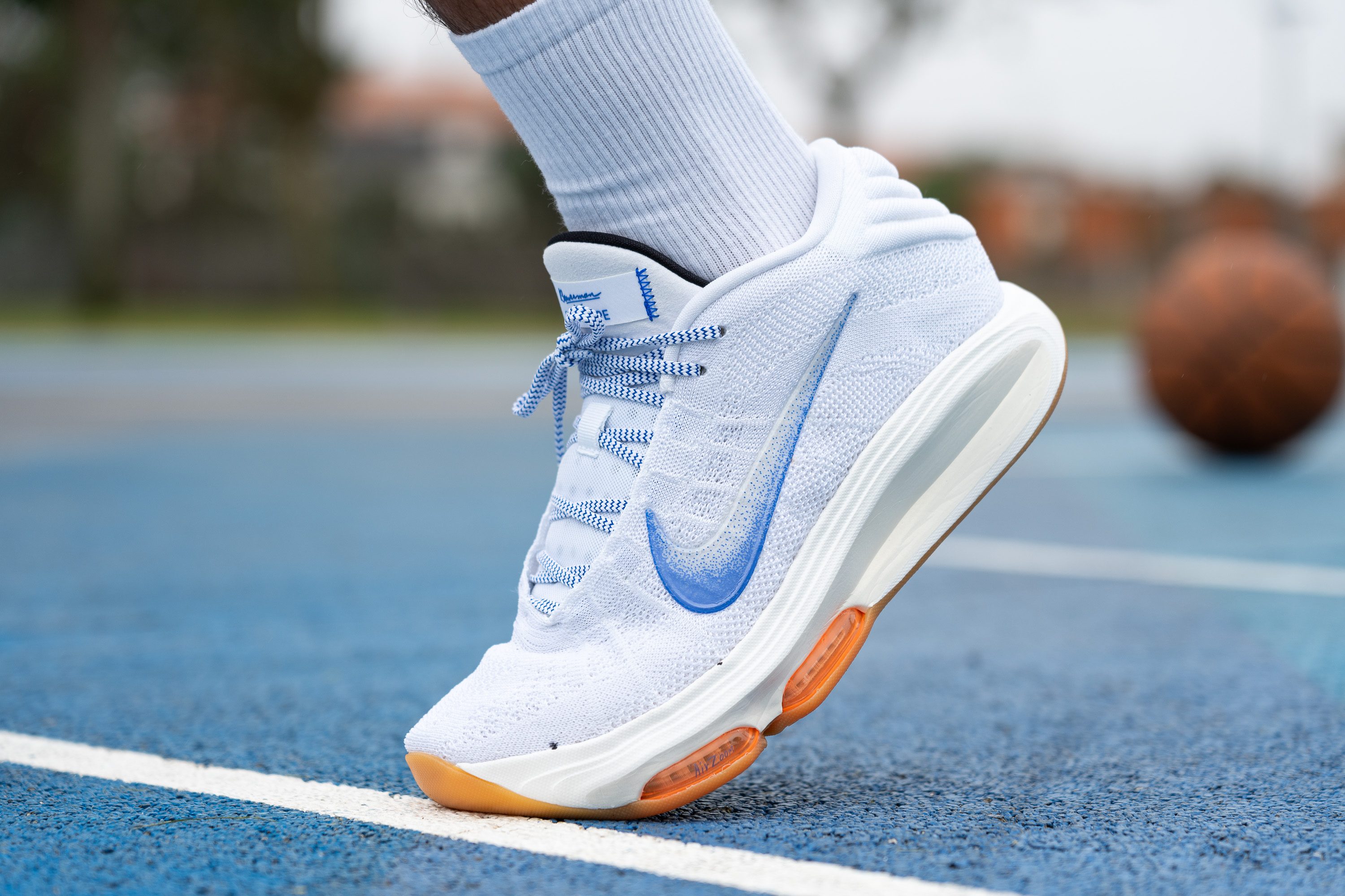 Nike hustle white hotsell