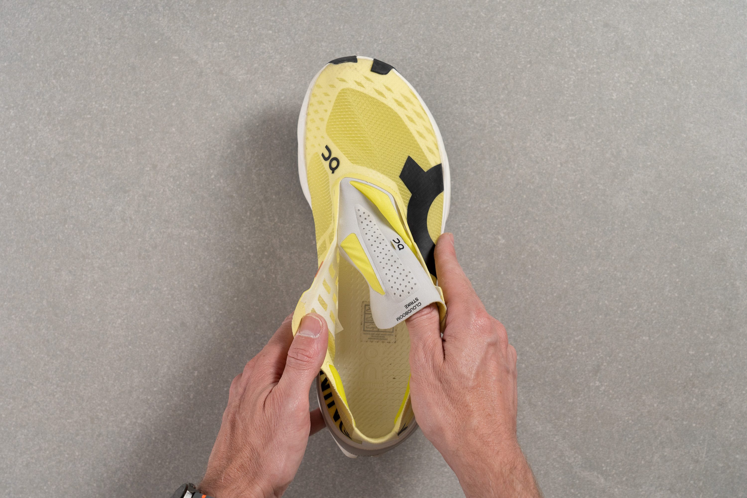 On Cloudboom Strike Tongue: gusset type