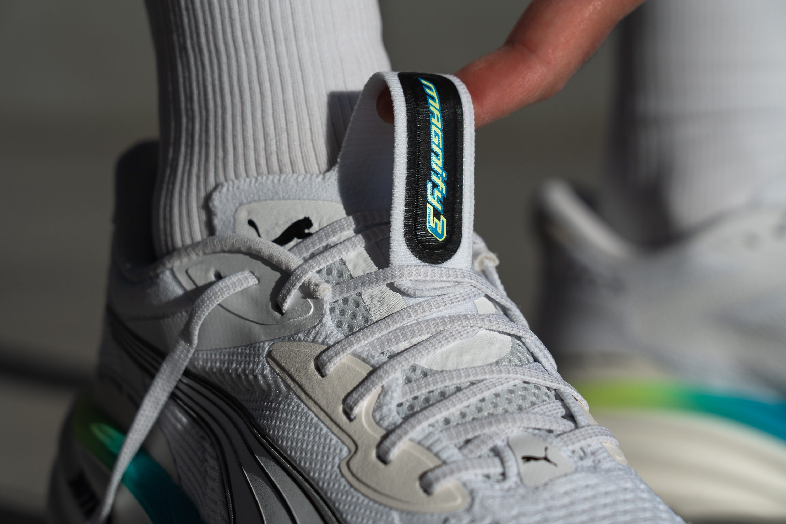 PUMA Magnify Nitro 3 tongue tab