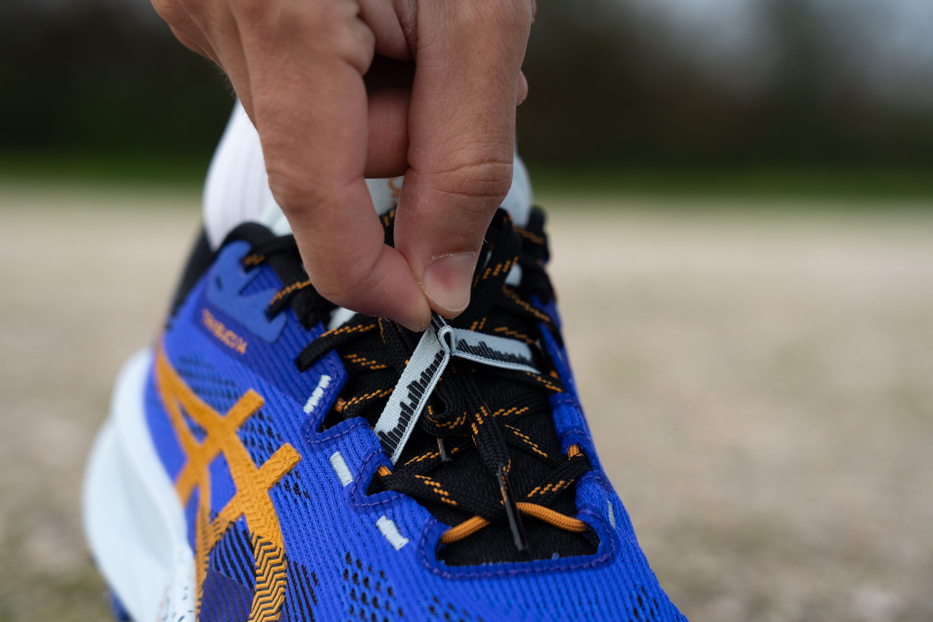 ASICS Trabuco 14 Lace keeper