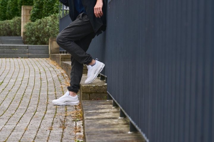 white nike air max 97 on feet