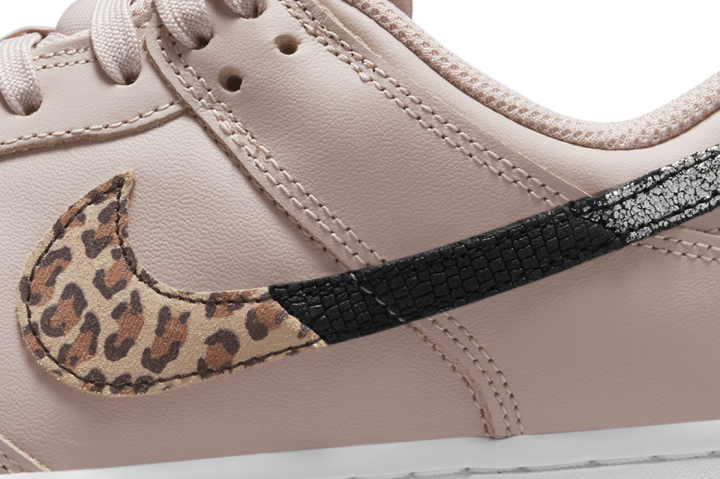 Nike Dunk Low SE sneakers in black + white | RunRepeat